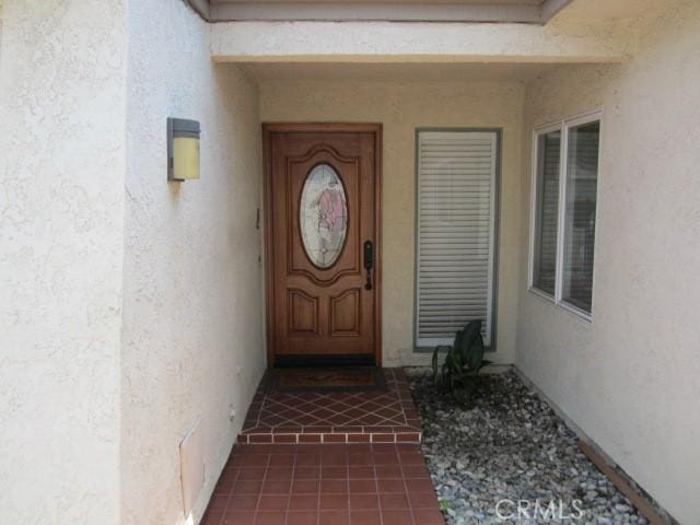 428 Champlain Dr, Claremont, CA 91711 - view of exterior entry with stucco siding