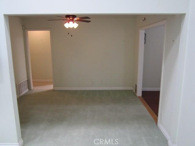 428 Champlain Dr, Claremont, CA 91711 - spare room with ceiling fan, light carpet, and baseboards