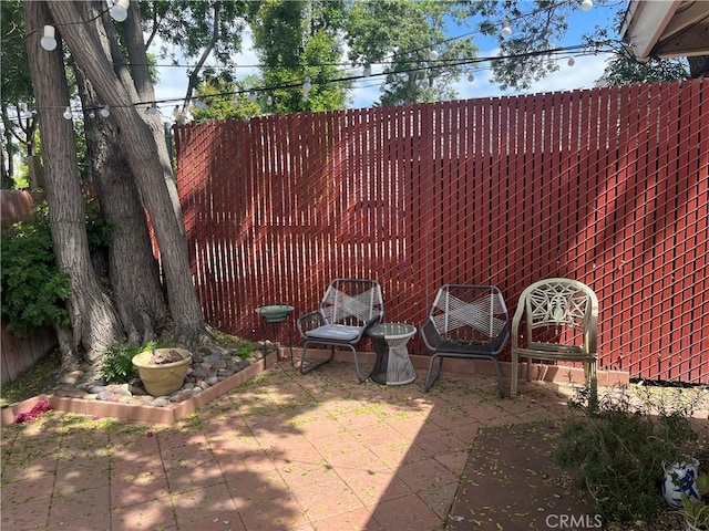 14782 Holt Ave, Tustin, CA 92780 - fenced backyard featuring a patio area