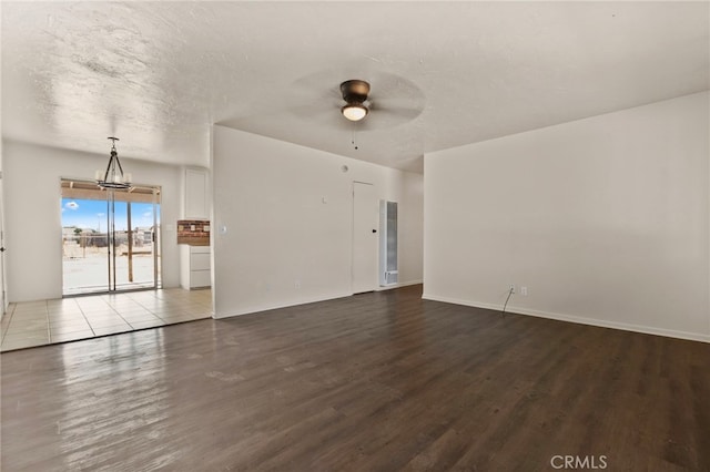 10793 Jamul Rd, Apple Valley, CA 92308 - unfurnished room featuring wood finished floors, a ceiling fan, baseboards, and a textured ceiling