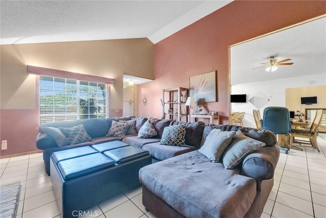 6765 Jadeite Ave, Rancho Cucamonga, CA 91701 - living room featuring light tile patterned floors, ceiling fan, and high vaulted ceiling