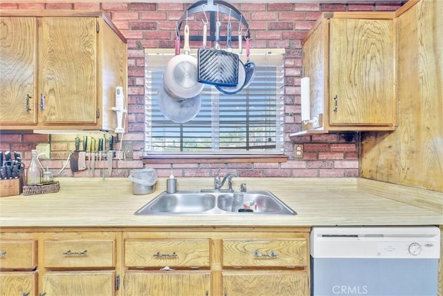 6765 Jadeite Ave, Rancho Cucamonga, CA 91701 - kitchen featuring a sink, white dishwasher, and light countertops