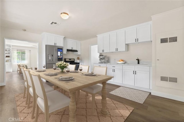 124 S Glengrove Ave, San Dimas, CA 91773 - dining area with wood finished floors and baseboards