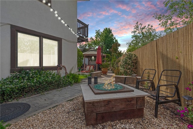 6978 Withers Rd, Riverside, CA 92506 - view of patio / terrace with a balcony and an outdoor fire pit