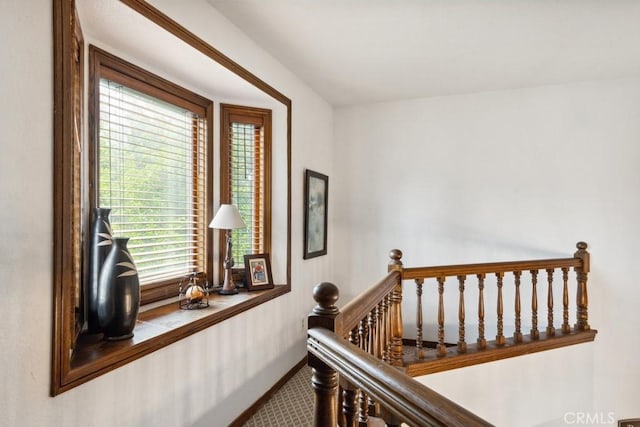 6978 Withers Rd, Riverside, CA 92506 - corridor featuring carpet flooring, an upstairs landing, and baseboards