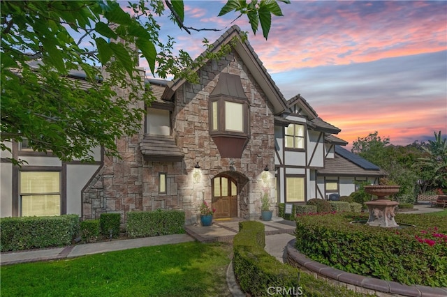 6978 Withers Rd, Riverside, CA 92506 - tudor-style house featuring stone siding and stucco siding