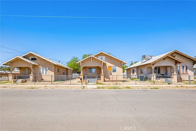 518 A St, Needles, CA 92363 - view of front of home featuring stucco siding and a gate