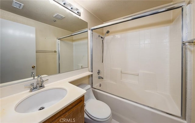 2069 W Fairview Dr, Rialto, CA 92377 - bathroom with toilet, vanity, and bath / shower combo with glass door