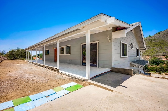 44196 La Cruz Dr, Temecula, CA 92590 - rear view of property with a porch and a patio