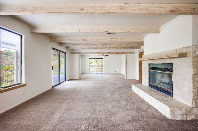 44196 La Cruz Dr, Temecula, CA 92590 - unfurnished living room with a glass covered fireplace, carpet, beamed ceiling, a ceiling fan, and heating unit