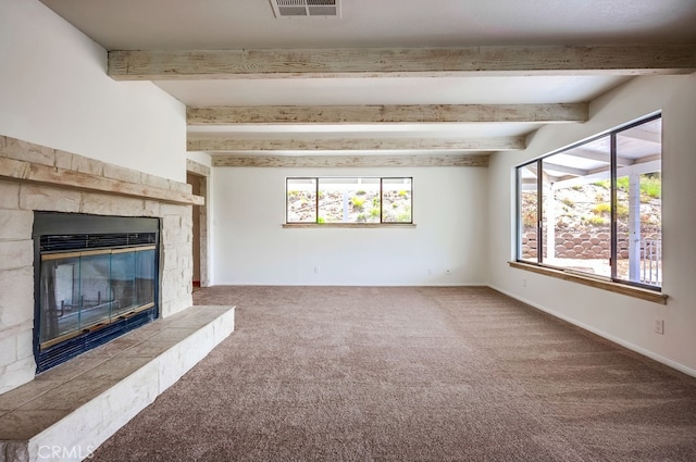 44196 La Cruz Dr, Temecula, CA 92590 - unfurnished living room with beam ceiling, a stone fireplace, and carpet floors