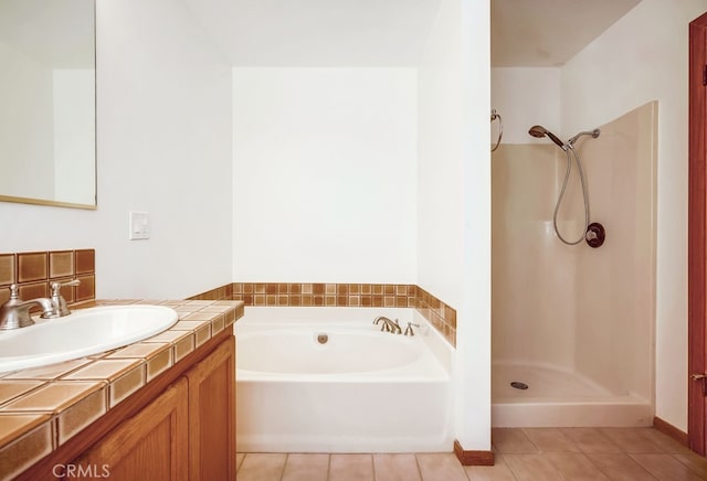 44196 La Cruz Dr, Temecula, CA 92590 - bathroom featuring tile patterned flooring, a garden tub, vanity, and a shower