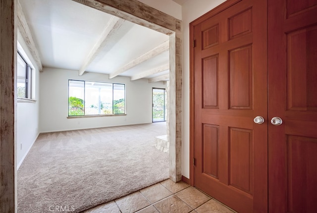 44196 La Cruz Dr, Temecula, CA 92590 - foyer entrance featuring light colored carpet, beam ceiling, plenty of natural light, and light tile patterned floors