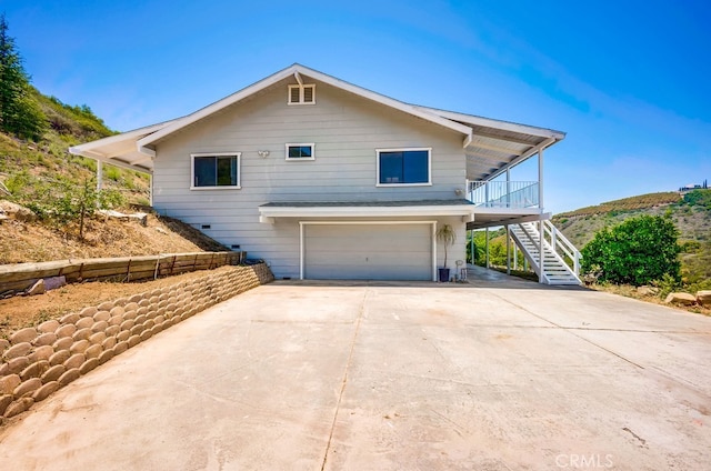 44196 La Cruz Dr, Temecula, CA 92590 - view of front of home featuring stairs, a garage, and concrete driveway