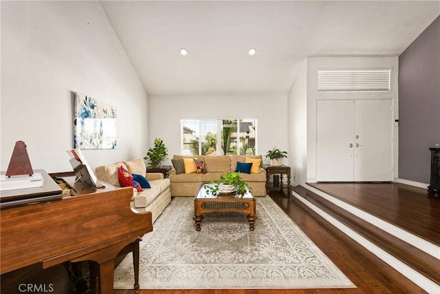 11818 Pocasset Dr, Whittier, CA 90601 - living area with wood finished floors, recessed lighting, and lofted ceiling