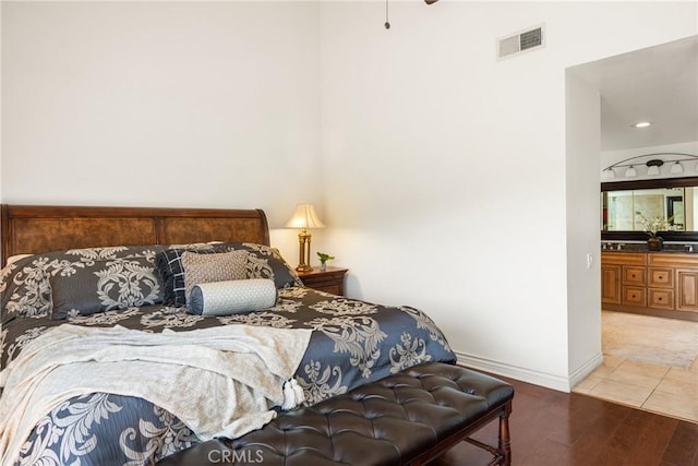 11818 Pocasset Dr, Whittier, CA 90601 - bedroom with wood finished floors and a towering ceiling