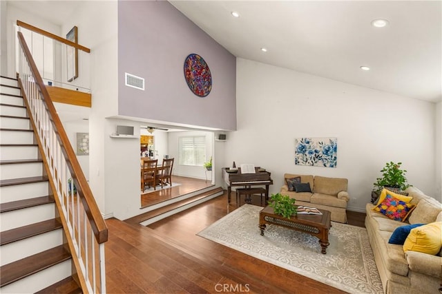 11818 Pocasset Dr, Whittier, CA 90601 - living room with stairway, high vaulted ceiling, wood finished floors, recessed lighting, and ceiling fan