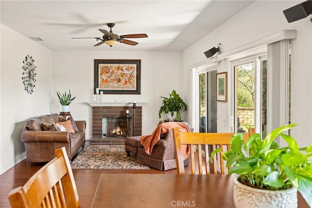 11818 Pocasset Dr, Whittier, CA 90601 - living area featuring wood finished floors, a fireplace, and ceiling fan