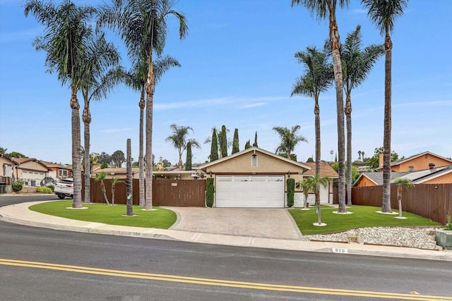 970 Carlsbad St, San Diego, CA 92114 - view of front of house featuring an attached garage, concrete driveway, stucco siding, and a residential view