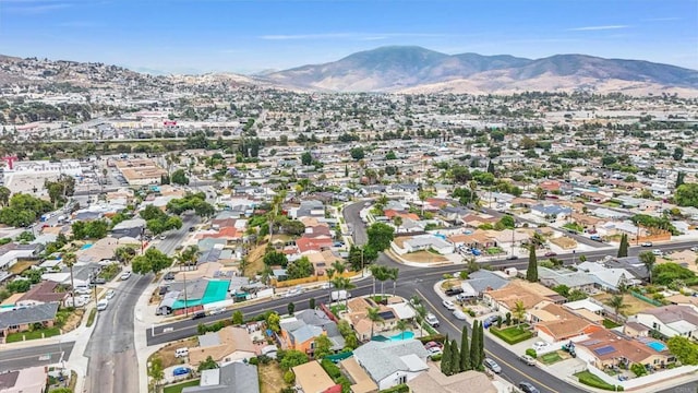 970 Carlsbad St, San Diego, CA 92114 - aerial view of property and surrounding area with mountains and nearby suburban area
