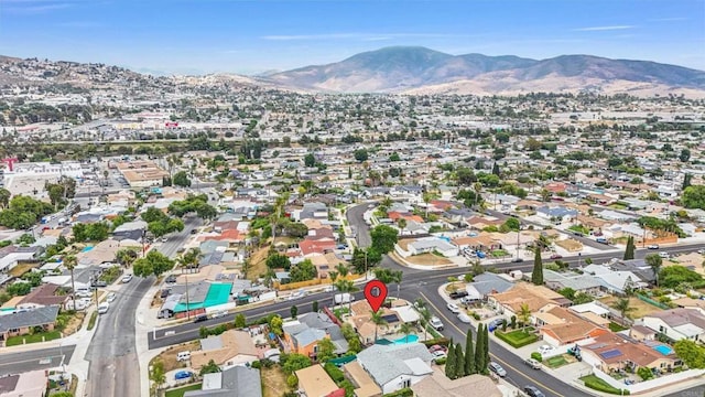 970 Carlsbad St, San Diego, CA 92114 - aerial overview of property's location with mountains and nearby suburban area
