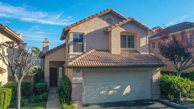 5787 Barbary Pl, Bonsall, CA 92003 - mediterranean / spanish home featuring a tiled roof, stucco siding, and a garage