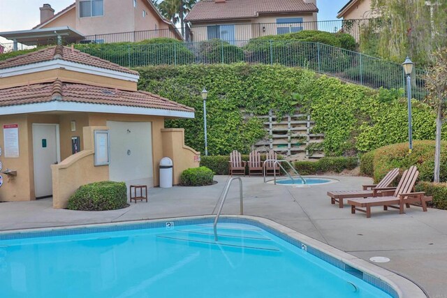 5787 Barbary Pl, Bonsall, CA 92003 - community pool featuring a patio area and a community hot tub