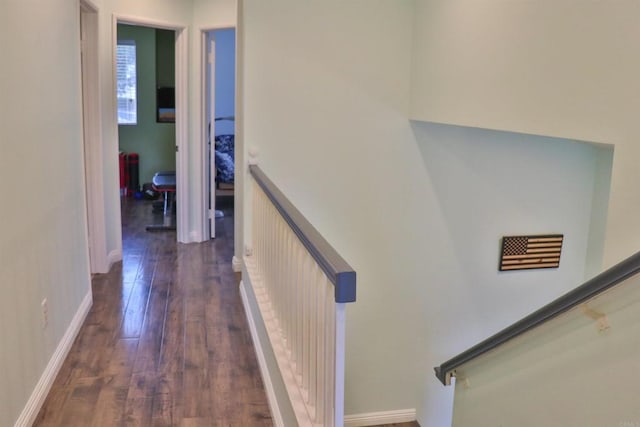 5787 Barbary Pl, Bonsall, CA 92003 - corridor featuring dark wood-type flooring, baseboards, and stairs