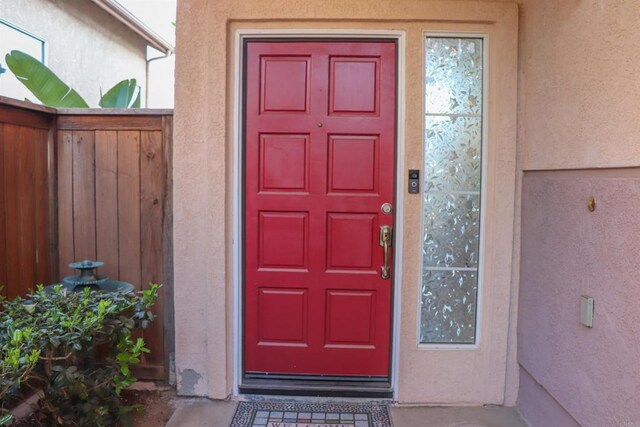 5787 Barbary Pl, Bonsall, CA 92003 - view of exterior entry featuring stucco siding