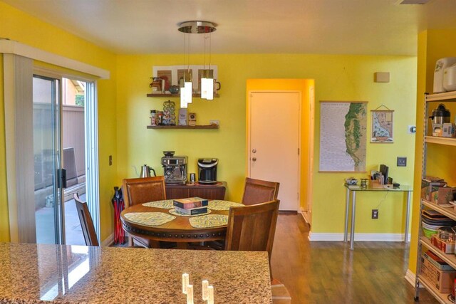 5787 Barbary Pl, Bonsall, CA 92003 - dining area with wood finished floors and baseboards