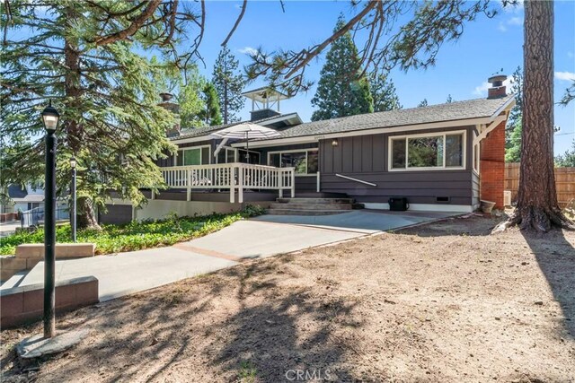 30955 Scenic Way, Running Springs, CA 92382 - ranch-style home featuring a chimney, a patio, and a wooden deck