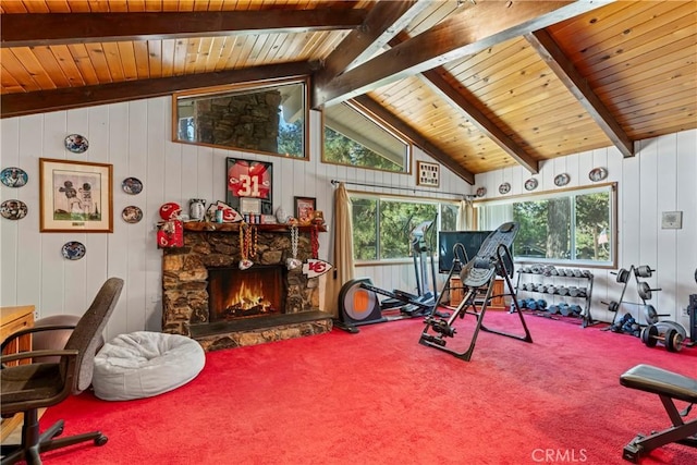 30955 Scenic Way, Running Springs, CA 92382 - workout room with carpet floors, a stone fireplace, lofted ceiling, wooden ceiling, and wood walls