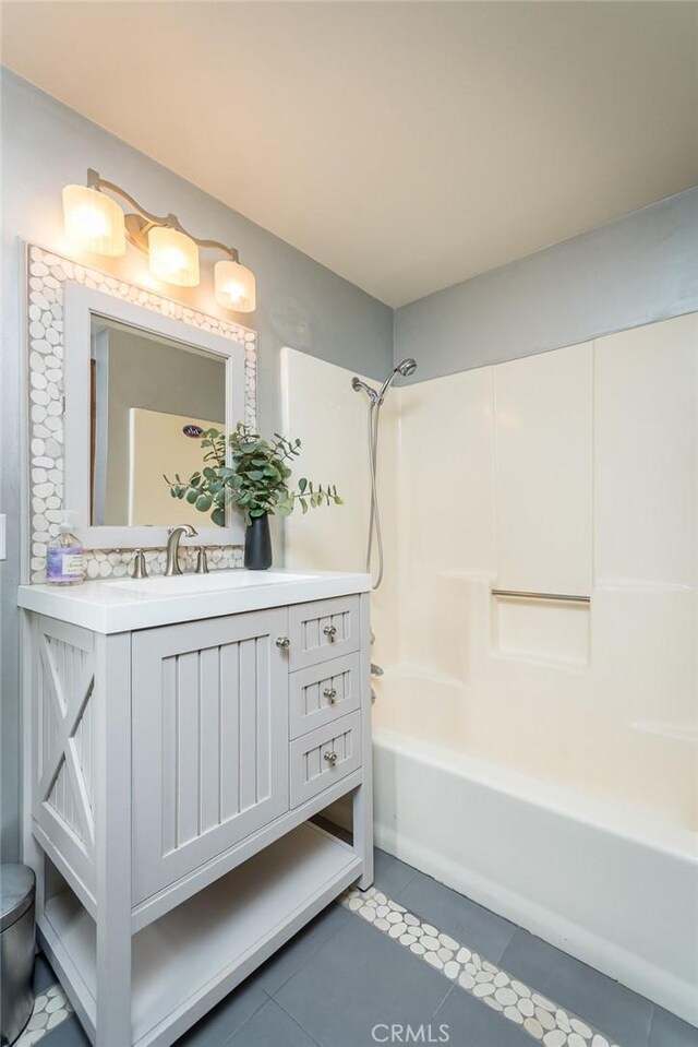 2410 W Cinco Casitas Ln, La Crescenta, CA 91214 - bathroom with bathtub / shower combination, vanity, tile patterned floors, and toilet