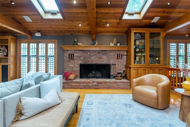 2410 W Cinco Casitas Ln, La Crescenta, CA 91214 - living room with a skylight, wood ceiling, wood finished floors, and a fireplace