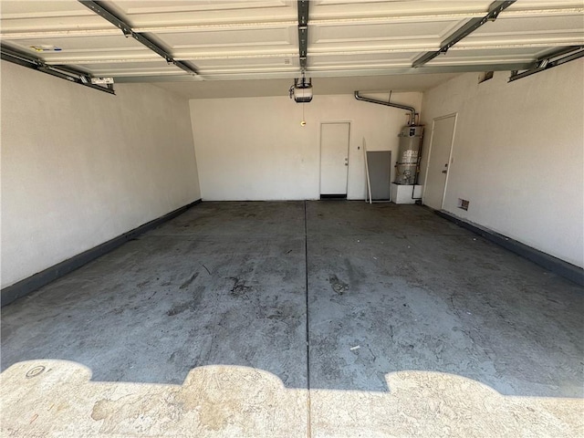 531 Corte, San Pablo, Perris, CA 92571 - garage with water heater and a garage door opener