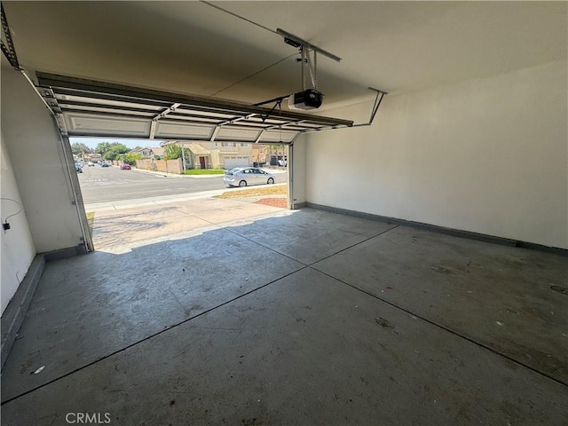 531 Corte, San Pablo, Perris, CA 92571 - garage with a garage door opener and baseboards