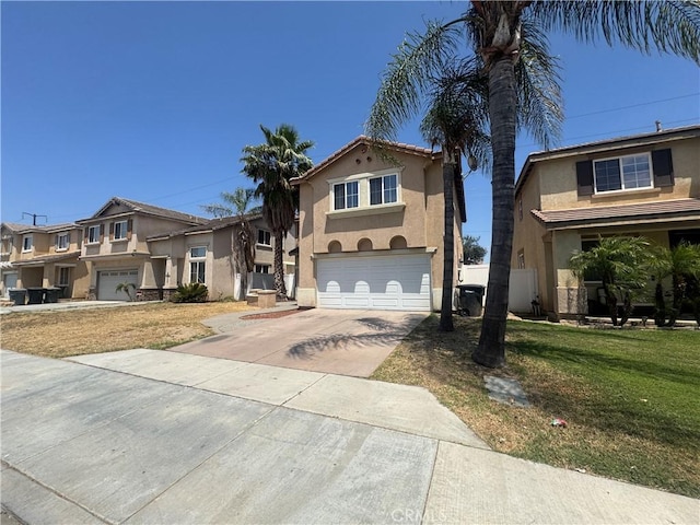 531 Corte, San Pablo, Perris, CA 92571 - view of front of property with stucco siding, driveway, an attached garage, and a front lawn
