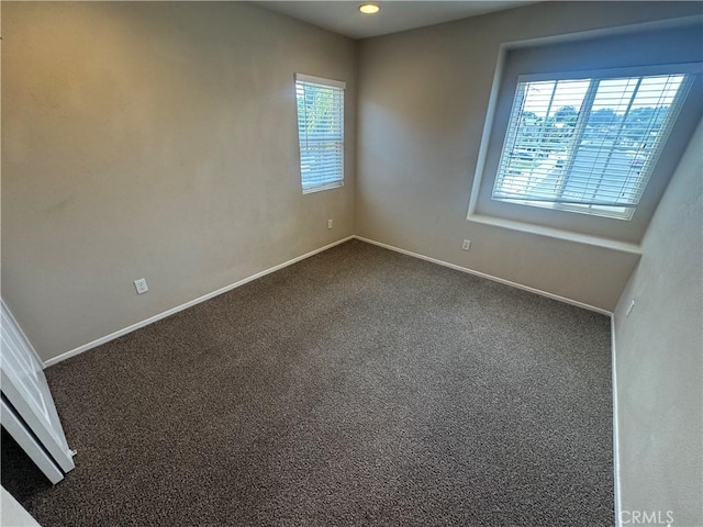 531 Corte, San Pablo, Perris, CA 92571 - spare room featuring dark colored carpet and baseboards