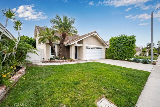 3 Rock Spgs, Irvine, CA 92604 - view of front of property featuring an attached garage, stucco siding, concrete driveway, and a tiled roof