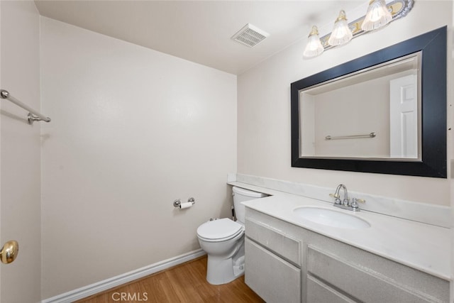 3 Rock Spgs, Irvine, CA 92604 - half bath with toilet, wood finished floors, vanity, and baseboards