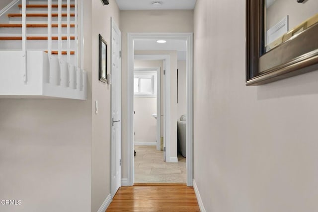 1045 Rotella St, Newbury Park, CA 91320 - hallway with wood finished floors and baseboards