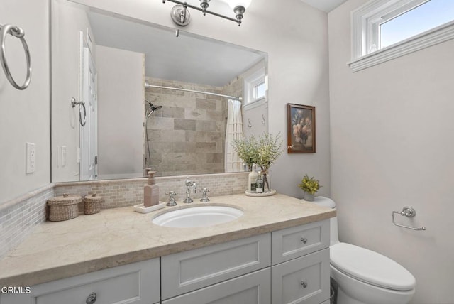 1045 Rotella St, Newbury Park, CA 91320 - bathroom featuring vanity, decorative backsplash, and tiled shower