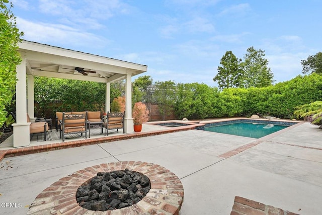 1045 Rotella St, Newbury Park, CA 91320 - view of swimming pool featuring a ceiling fan, a patio area, an outdoor living space with a fire pit, and a pool with connected hot tub