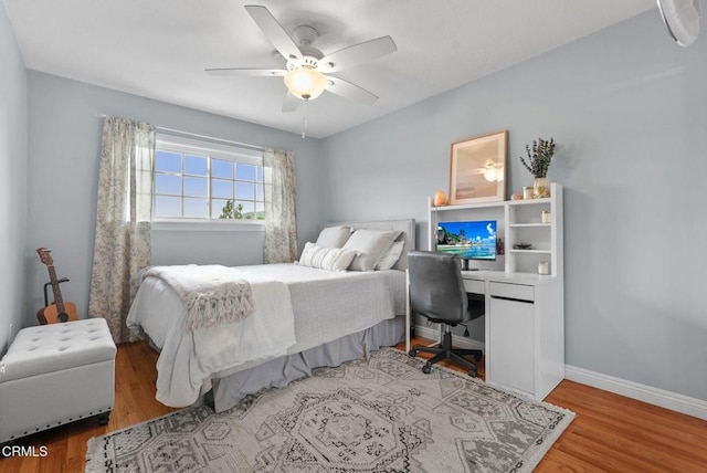 1045 Rotella St, Newbury Park, CA 91320 - bedroom with wood finished floors, a desk, and a ceiling fan