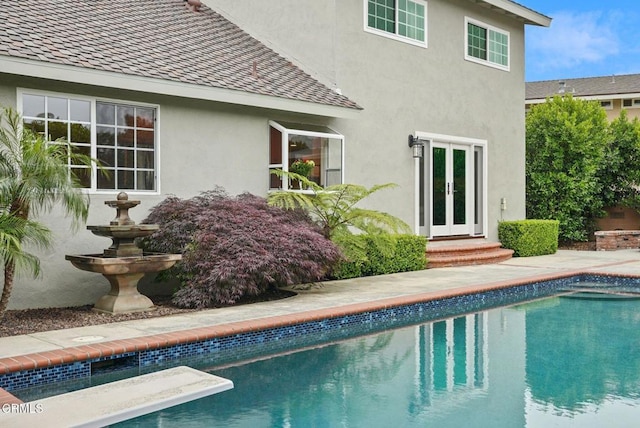 1045 Rotella St, Newbury Park, CA 91320 - swimming pool featuring french doors and a diving board