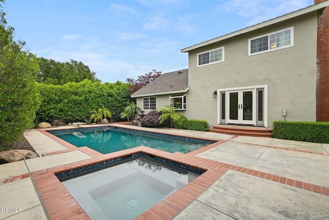 1045 Rotella St, Newbury Park, CA 91320 - outdoor pool with french doors, an in-ground hot tub, and a patio area