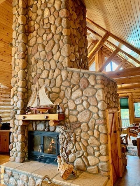 826 Boulder Rd, Big Bear Lake, CA 92315 - detailed view of rustic walls, wood finished floors, a fireplace, and wood ceiling