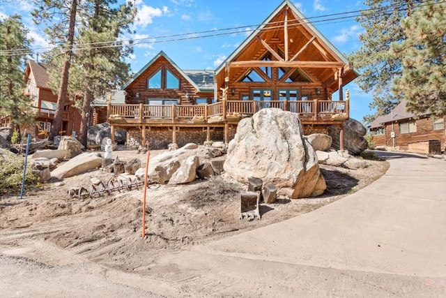 826 Boulder Rd, Big Bear Lake, CA 92315 - back of house with log siding and a deck