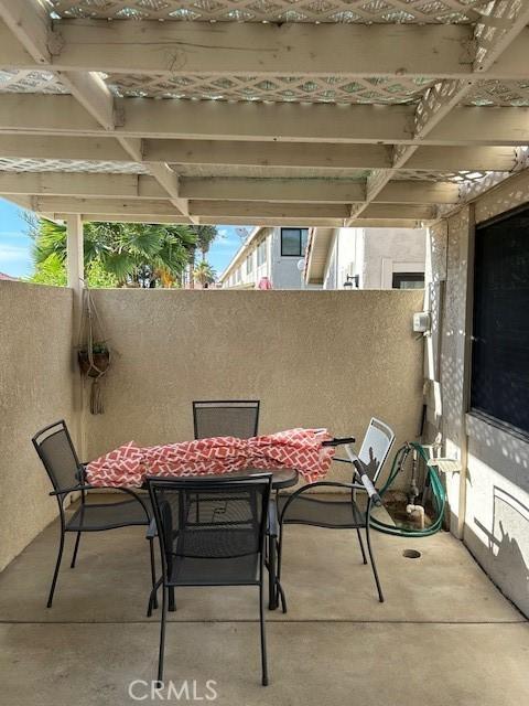 61765 Arroyo Rd Unit 5, Palm Springs, CA 92264 - view of patio with outdoor dining space