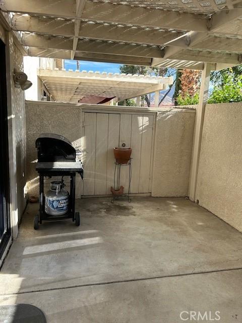 61765 Arroyo Rd Unit 5, Palm Springs, CA 92264 - view of patio with grilling area